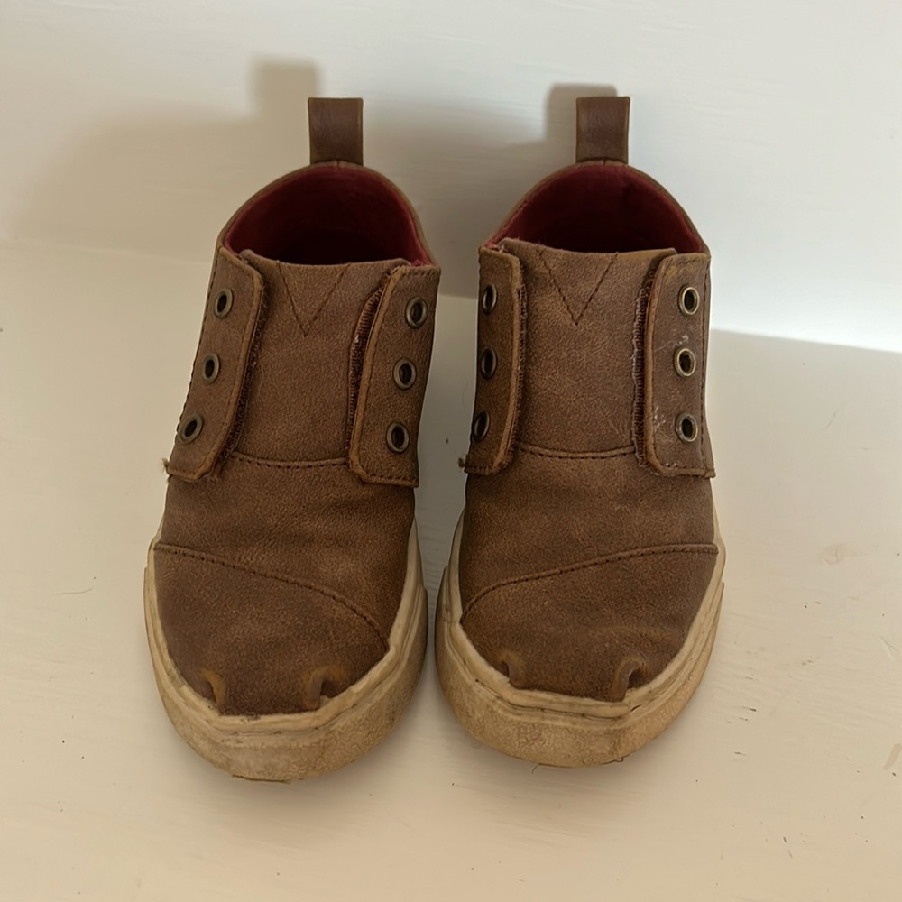 Tom’s boots